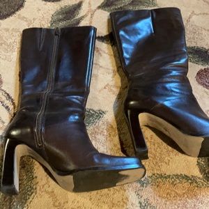 High heel brown leather boots